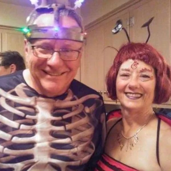 A man and woman dressed up for halloween.